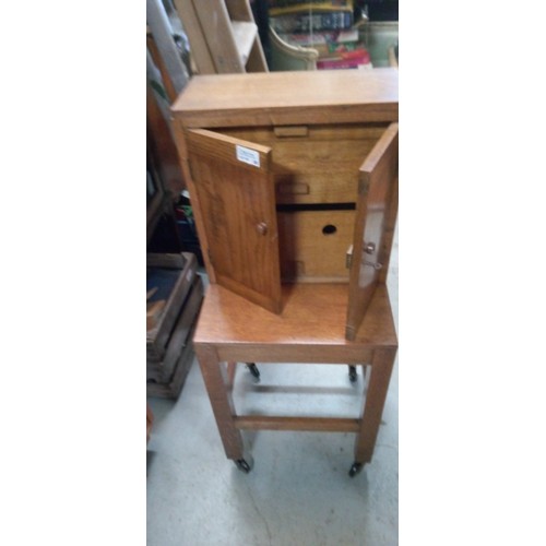 705 - A Mid Century Side Table with Storage Drawers. 89cm H x 36cm W x 34cm D.