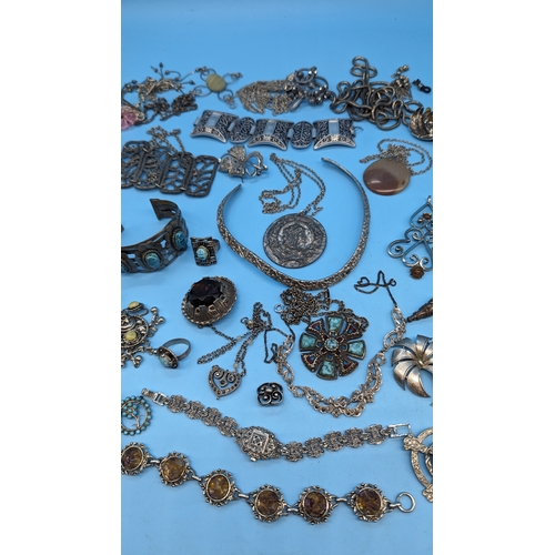 419 - A Quantity of White Metal Jewellery