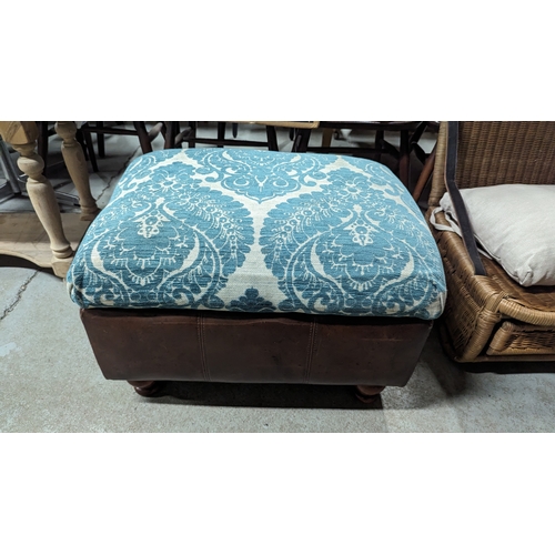 609B - An Upholstered Pouffe with Storage