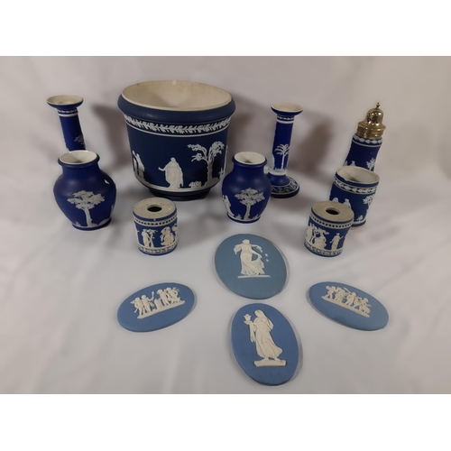 276 - A Collection of Wedgewood Jasperware including Candle Stick Holders, Vases and More.