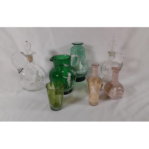 277 - A Collection of Glassware by Mary Gregory in various styles and colours. Including Jugs, Decanters, ... 