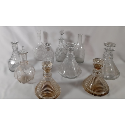 284 - A Range of Decanters including 4 Antique Ships Decanters in two sizes with Mushroom Stoppers and Sta... 