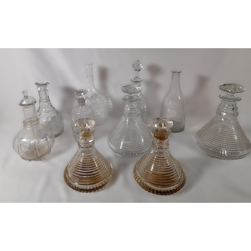 284 - A Range of Decanters including 4 Antique Ships Decanters in two sizes with Mushroom Stoppers and Sta... 