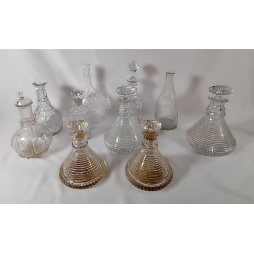 284 - A Range of Decanters including 4 Antique Ships Decanters in two sizes with Mushroom Stoppers and Sta... 