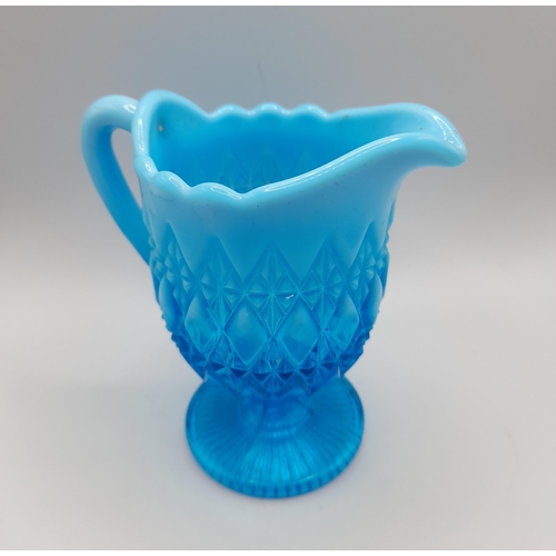 287 - A Collection of Decorative Blue Ruffle/Carnival Glassware including a pair of Stem Vases with Glitte... 