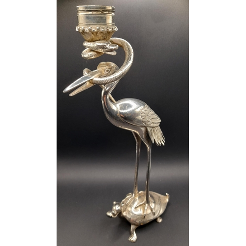 291 - A Pair of Stork and Snake Design Candlestick Holders, 27cm H,  and a Solid Brass Snake.