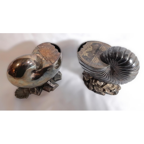 294 - A Pair Of Silverplateware Nautilus Shell Design Table Spoon Warmers.