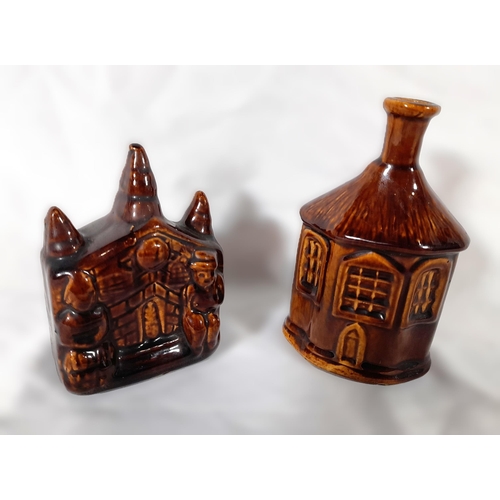 297 - A Pair of Treacle Glaze Ornaments, one being a Liquor bottle (13cm H) and the other a Money Box (11c... 