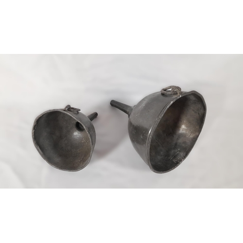 65 - A Set of two Antique Pewter Wine Funnels. Large measures 20cm H x 15 D, Small 14 H x 11D.