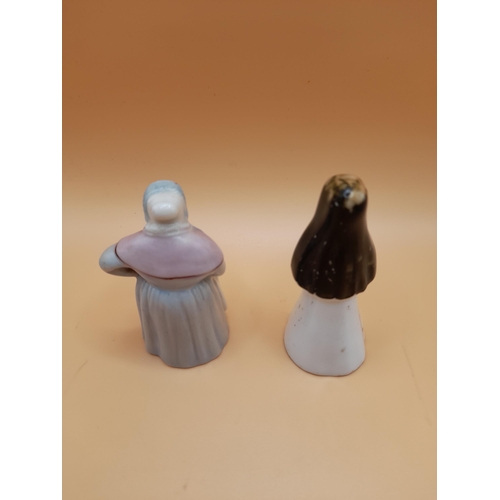 19 - A Pair of Antique Candle Snuffers. A Royal Worcester Lady and A Nun.