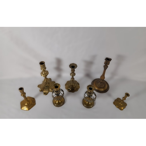 51 - A Mixed Lot of Brass Candlestick Holders.