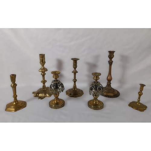 51 - A Mixed Lot of Brass Candlestick Holders.