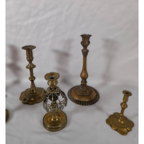 51 - A Mixed Lot of Brass Candlestick Holders.