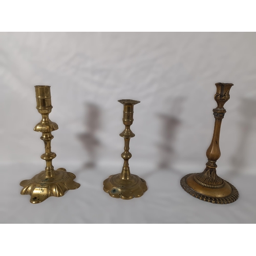 51 - A Mixed Lot of Brass Candlestick Holders.