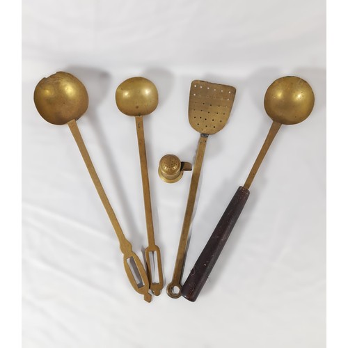 50 - A Selection of Brass Ladles and a Brass Spatula with a Brass Muffineer.