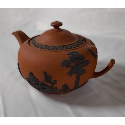 302 - 3 Pieces of vintage Wedgewood comprising of terracotta 
tea pot ( damaged handle as pictured) , blac... 