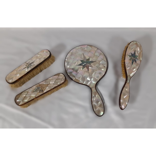 309 - Set Of 3 Antique Mother Of Pearl Clothes brushes with matching hand mirror