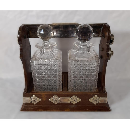 42 - 2 Bottle Tantalus Wood and Silver Plate Lockable  (no key and decanter stoppers not matching).