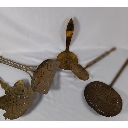 319 - A Collection of 5 Antique Brass Cooking Utensils, including a right angles Skimmer. Approx 55cm L.