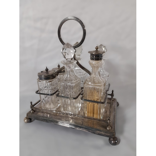 326 - A Silver Plated Cruet Set, intact with all stoppers.