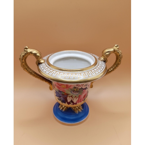 329 - 3 Small Urn Style Vases. The larger is 9.5cm H with Floral and Gilt Decoration and has 