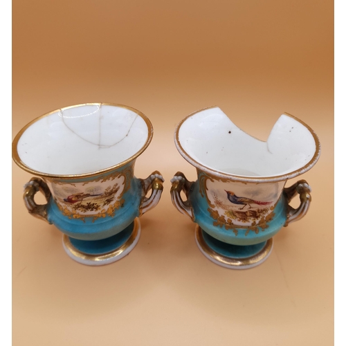 329 - 3 Small Urn Style Vases. The larger is 9.5cm H with Floral and Gilt Decoration and has 