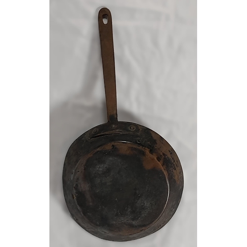 332 - An Antique Copper Pan and Jug. Pan 20cm Diameter, Jug approx 11cm H with Stamps applied.