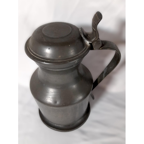 337 - A Collection of Pewter Items including 3 Lidded Tankards/Jugs and 4 Smaller Pewter Tankards. 

Large... 