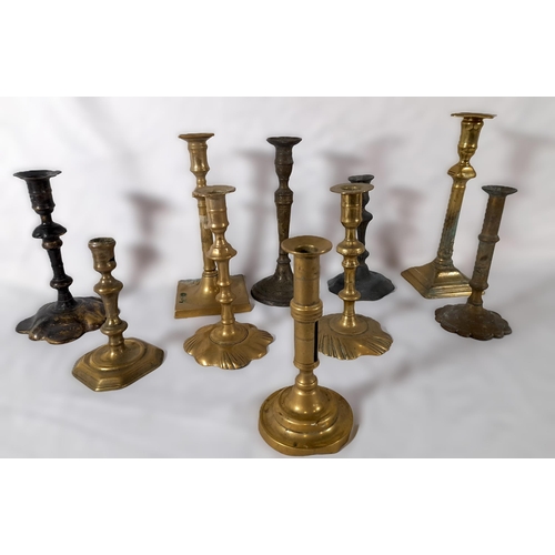 342 - A Selection of non matching Antique Brass Candlestick Holders. 10 in Total.