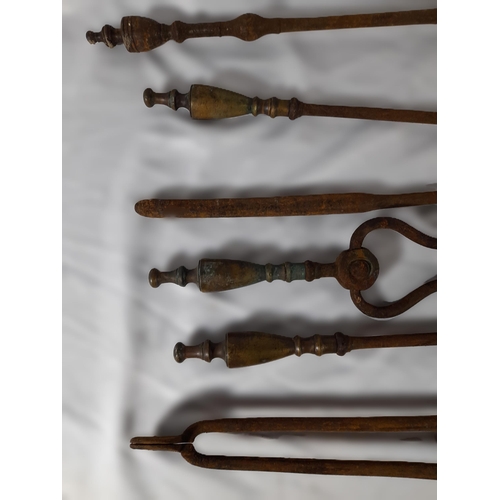 353 - Two Sets of Antique Fire Irons. 2 Shovels, 2 Pairs of Tongs and 2 Pokers. All with Surface Rust.