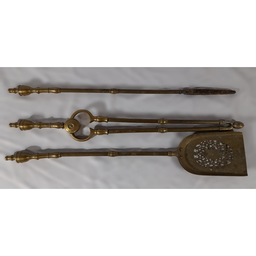 359 - A Complete Set Of Victorian Brass Fire Irons including a Shovel, Tongs and Poker. approx. 61cm in L.