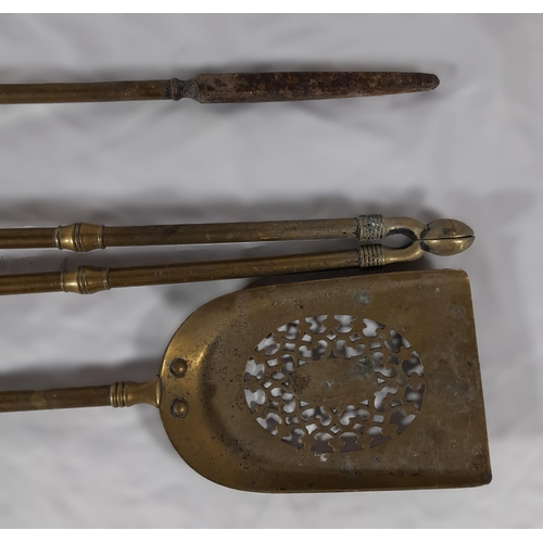 359 - A Complete Set Of Victorian Brass Fire Irons including a Shovel, Tongs and Poker. approx. 61cm in L.