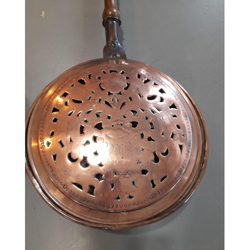 361 - A Pair of Antique Copper Bed Warming Pans with Decoration and Wooden Handles. Approx 105cm L.