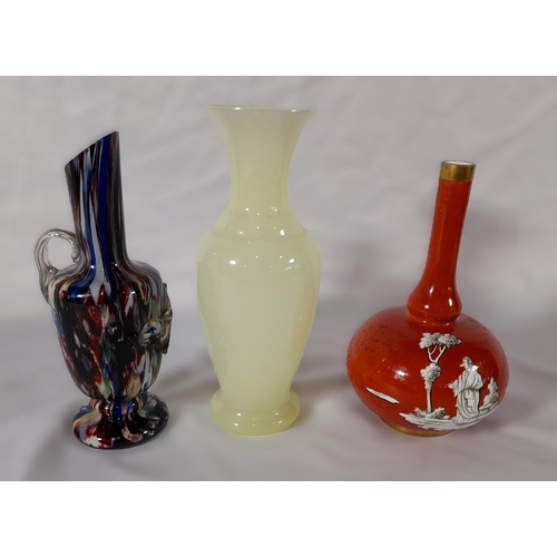 365 - A Trio of Vases. One in Multi Colour Carnival Glass (18 cm H), One in Light Yellow (20cm) and the ot... 