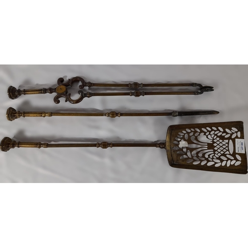 366 - A Set of Three Antique Fire Irons with Decorative Knobs. A Shovel, Set of Tongs and a Poker. 67cm L.