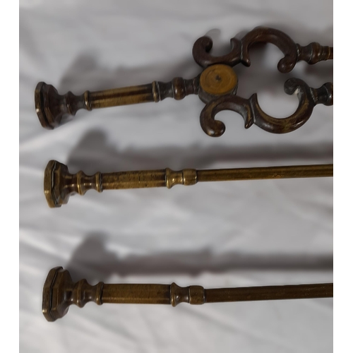 366 - A Set of Three Antique Fire Irons with Decorative Knobs. A Shovel, Set of Tongs and a Poker. 67cm L.