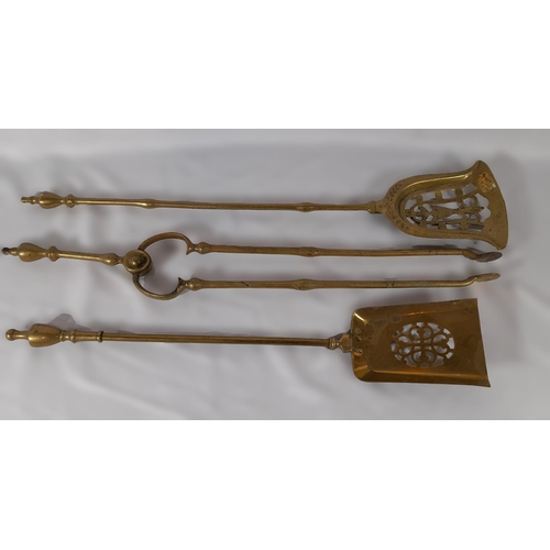 373 - 3 Antique Brass Fire Irons, 2 Decorative Shovels and a Pair of Tongs.