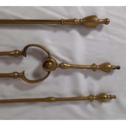 373 - 3 Antique Brass Fire Irons, 2 Decorative Shovels and a Pair of Tongs.