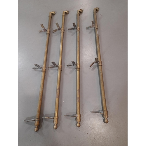 379 - A Set of 4 Antique Brass Trolley Legs with Castors.