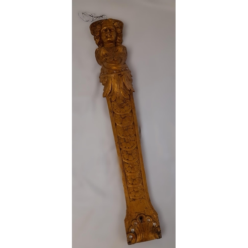 556 - A Gold Painted, Hard Wood Wall Hanging of A Carved Lady with Decoration. 66cm Length.