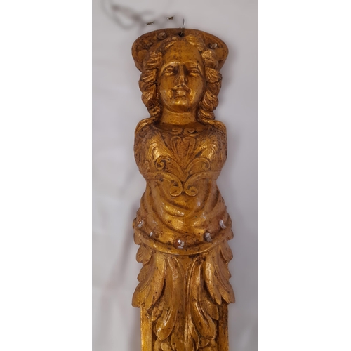 556 - A Gold Painted, Hard Wood Wall Hanging of A Carved Lady with Decoration. 66cm Length.