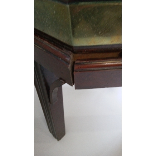 4 - A Mahogany Brass Bound Octagonal wine cooler with lead lined sectional interior. Damage to stand as ... 