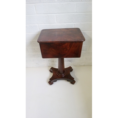 740 - A Flame Mahogany Work Table with key, 3 Drawers Tapered Column and scrolled feet.
72cm high, 48cm wi... 