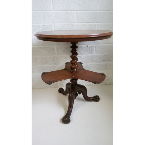 8 - A Victorian Inlaid parquetry centre table, with carved tripod base.
70cm high,58x58cms.