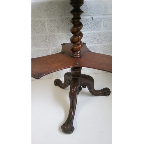 8 - A Victorian Inlaid parquetry centre table, with carved tripod base.
70cm high,58x58cms.