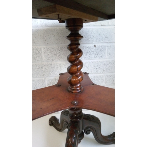 8 - A Victorian Inlaid parquetry centre table, with carved tripod base.
70cm high,58x58cms.