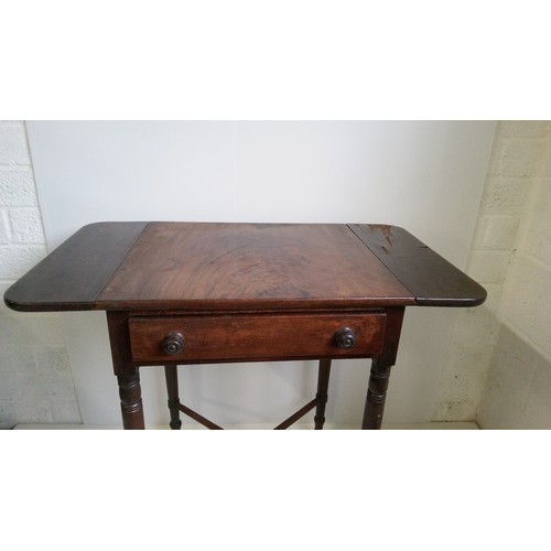 749 - A small regency Pembroke drop leaf work/lamp table with drawer on turned legs with cross stretcher. ... 