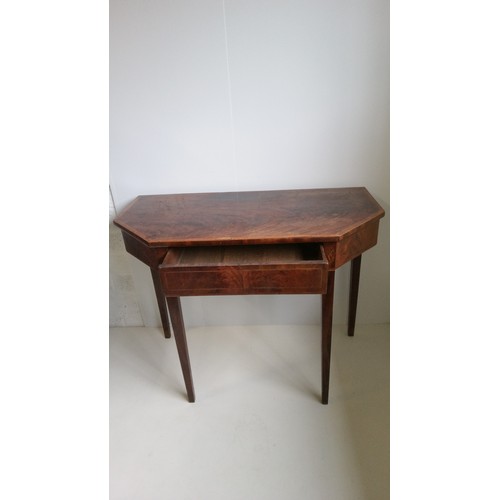 752 - A Flame Mahogany Hall table with drawer.
71cm high, 91cm wide,45cm deep.