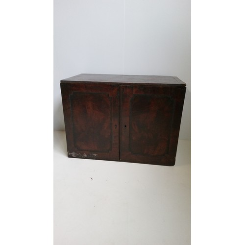 755 - An Antique Collectors Cabinet With Mahogany Flame Veneer.
39cm high,53cm wide,28cm deep.