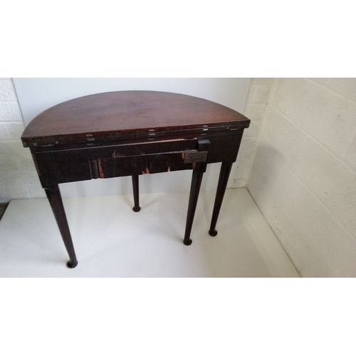 763 - A Mahogany Fold Over Table On Pad Feet In Need Of Repair To Back leg As Pictured.
74cm High,89cm Wid... 